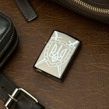 Електроімпульсна запальничка з патріотичним гравіюванням Електроімпульсна запальничка з патріотичним гравіюванням фото